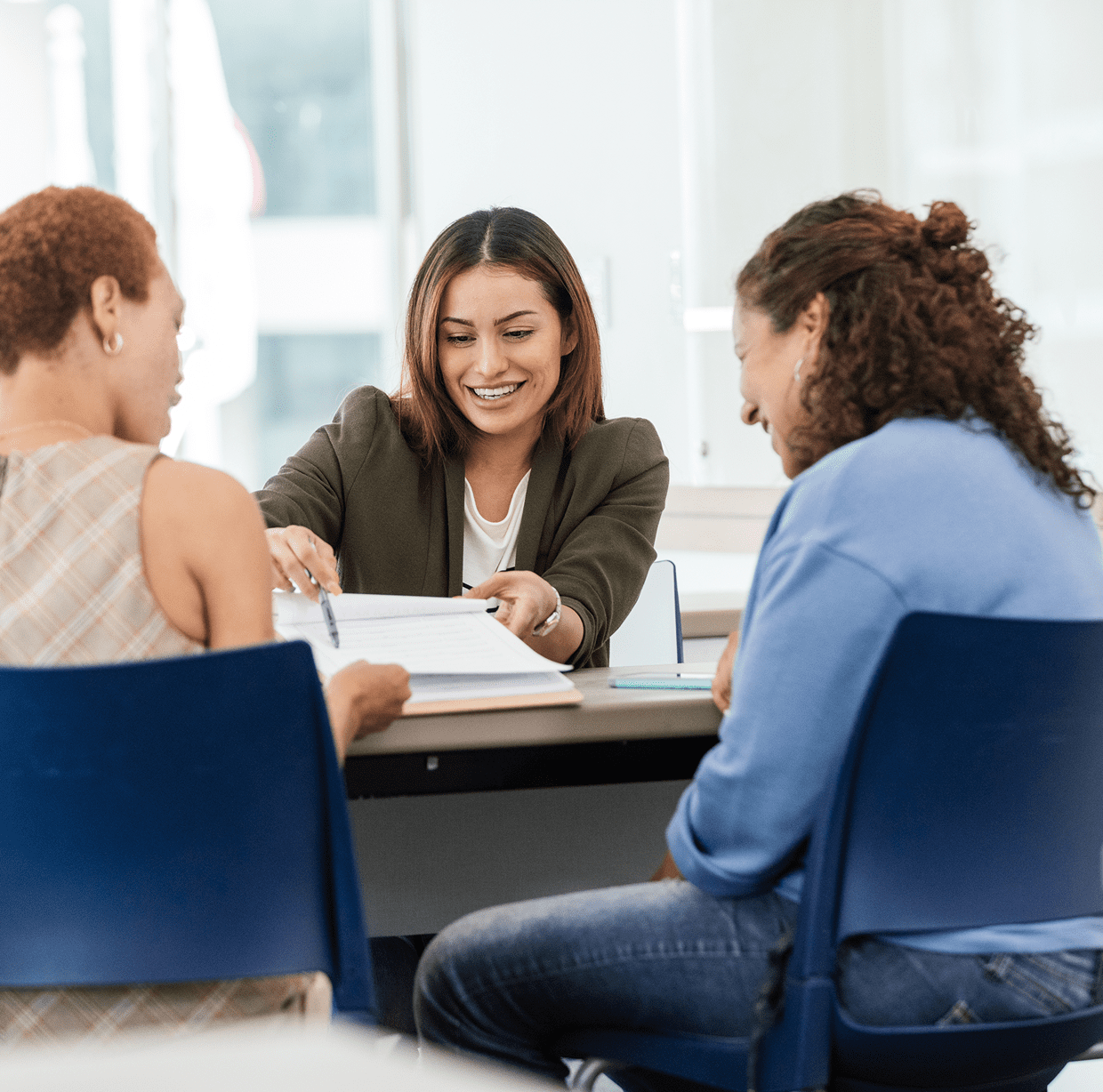 Three women having a business meeting together.